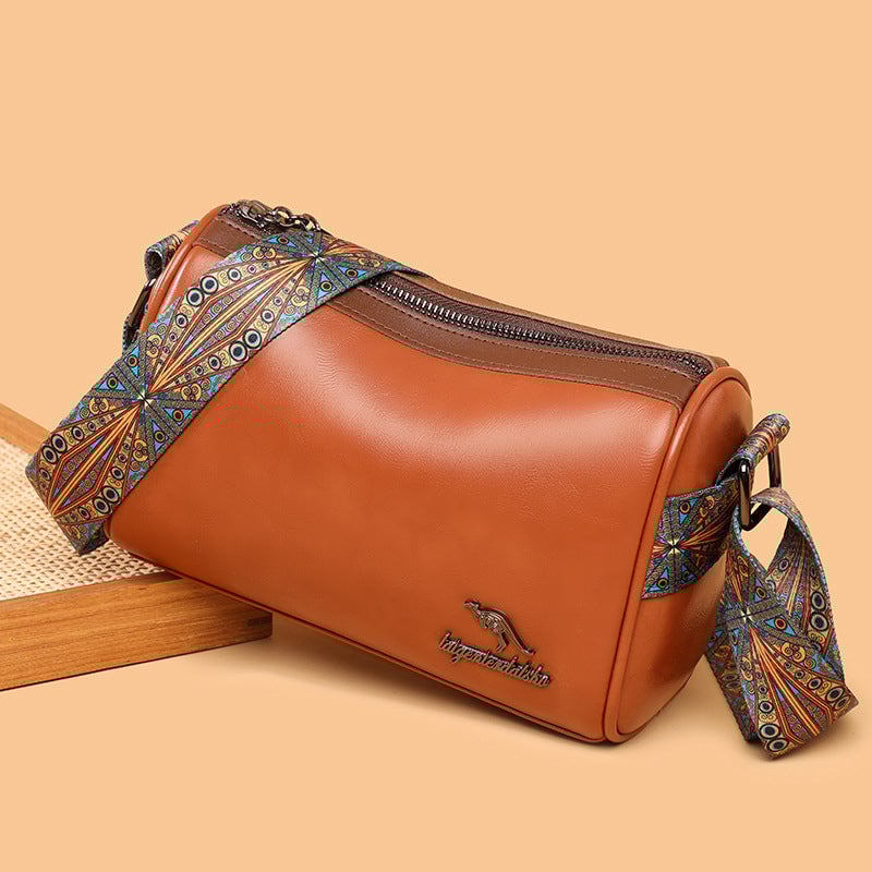 Versatile shoulder bag with wide shoulder strap for women