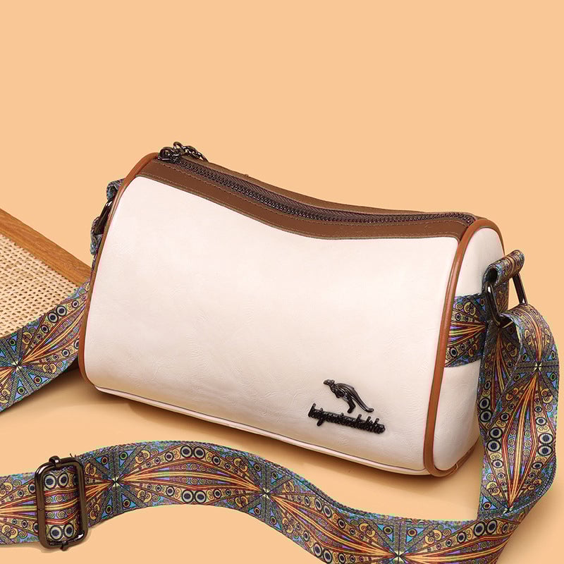 Versatile shoulder bag with wide shoulder strap for women