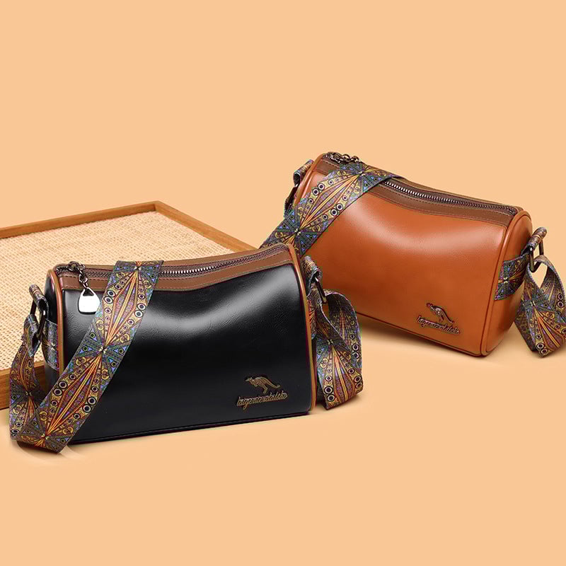 Versatile shoulder bag with wide shoulder strap for women