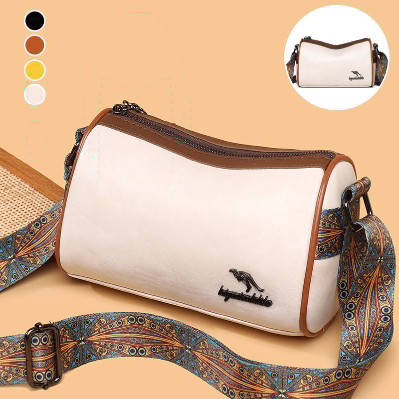 Versatile shoulder bag with wide shoulder strap for women