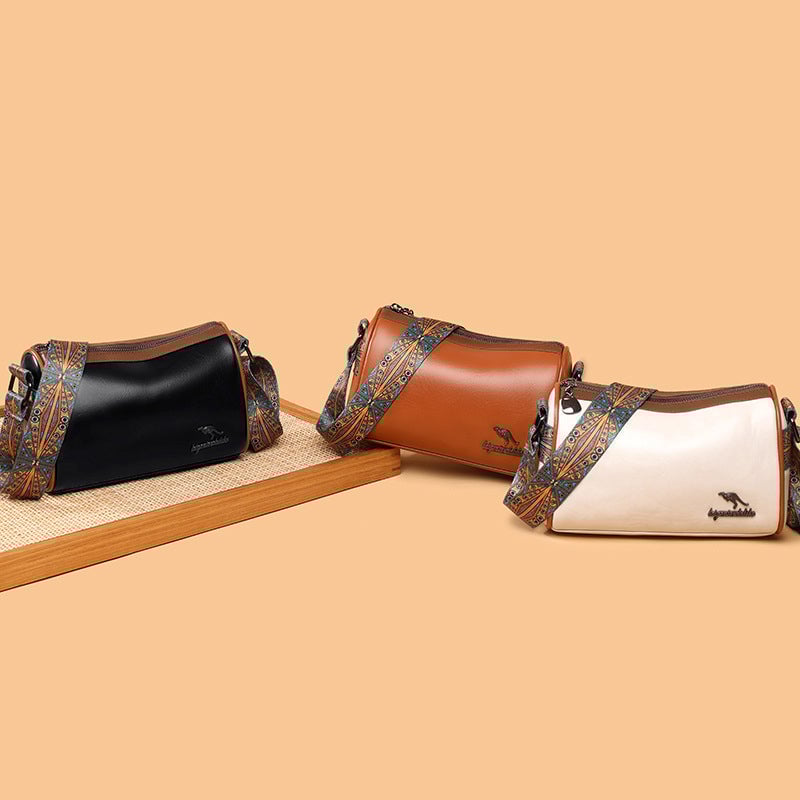 Versatile shoulder bag with wide shoulder strap for women