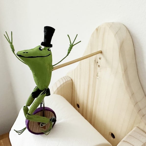 Frog On Unicycle Toilet Paper Holder